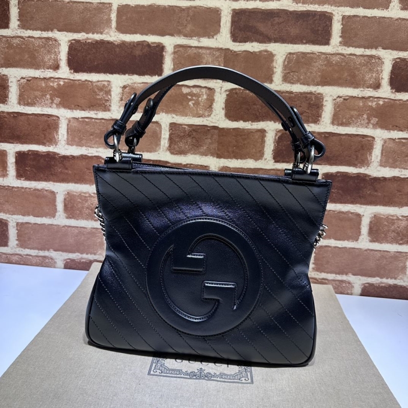 G*u*i top handle bags